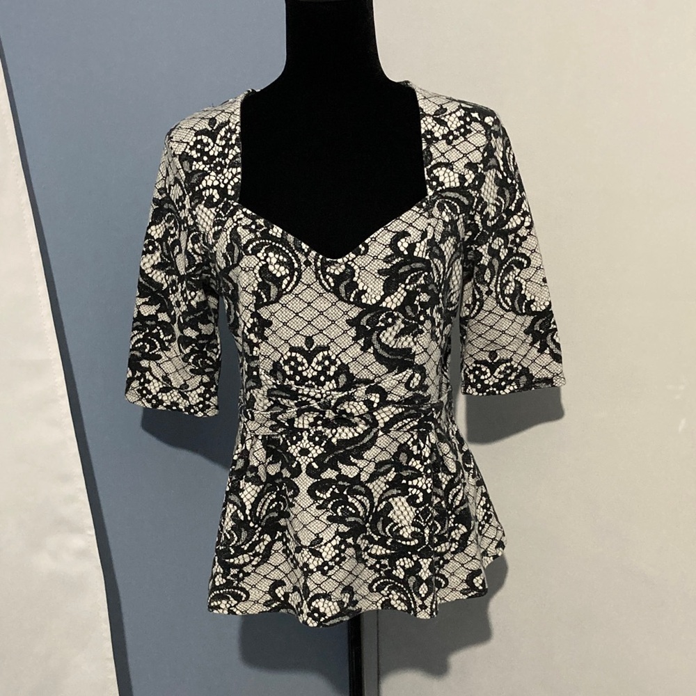 Elegant Black and White Lace-like Top